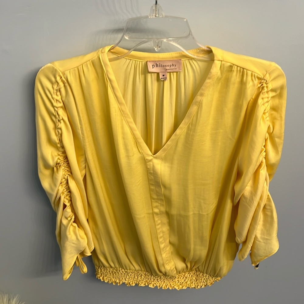 Philosophy, yellow blouse, size medium, never worn.